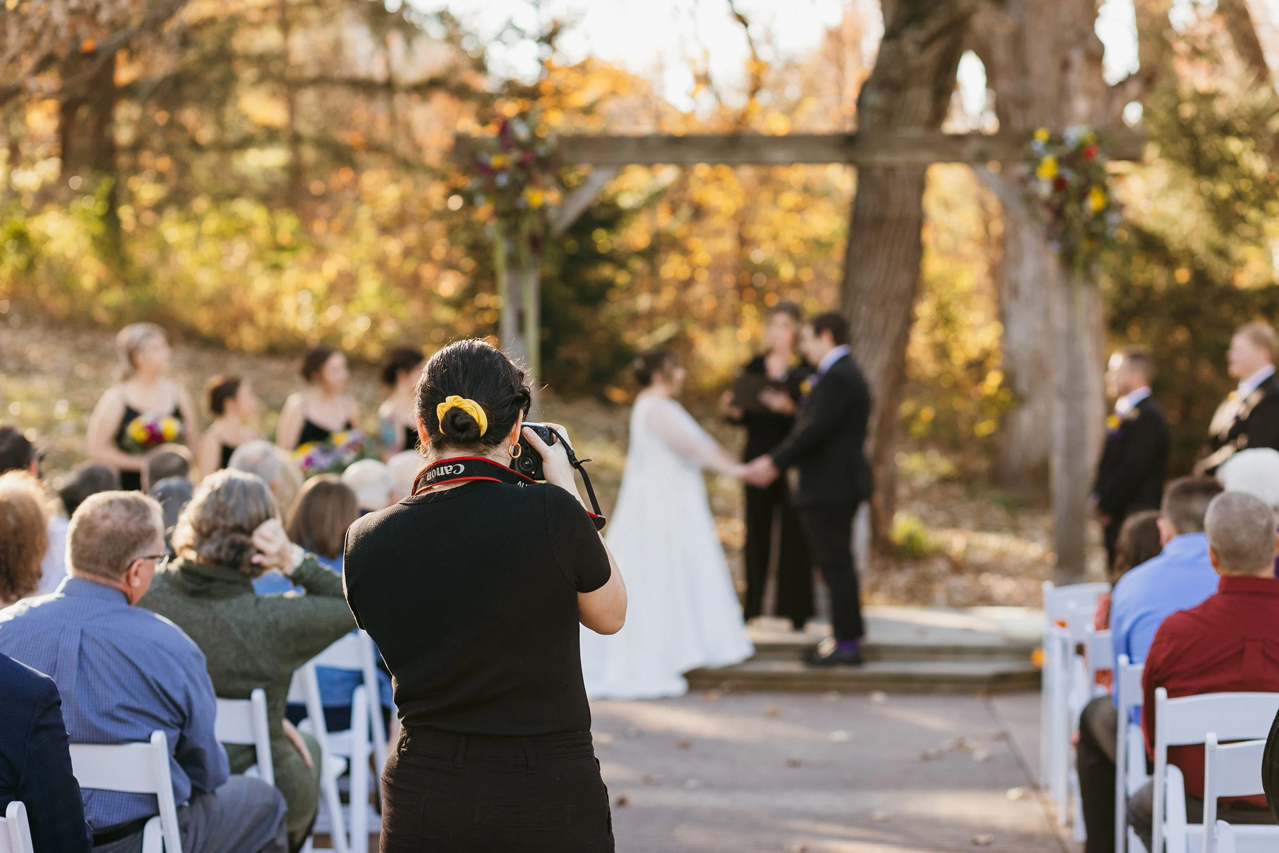 amelia photographing outdoor fall wedding