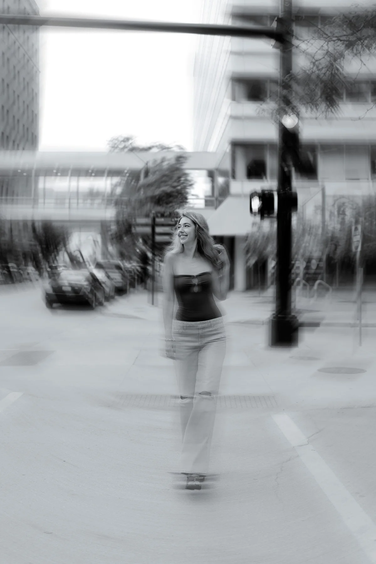 waukee urbandale iowa senior girl walking downtown artsy