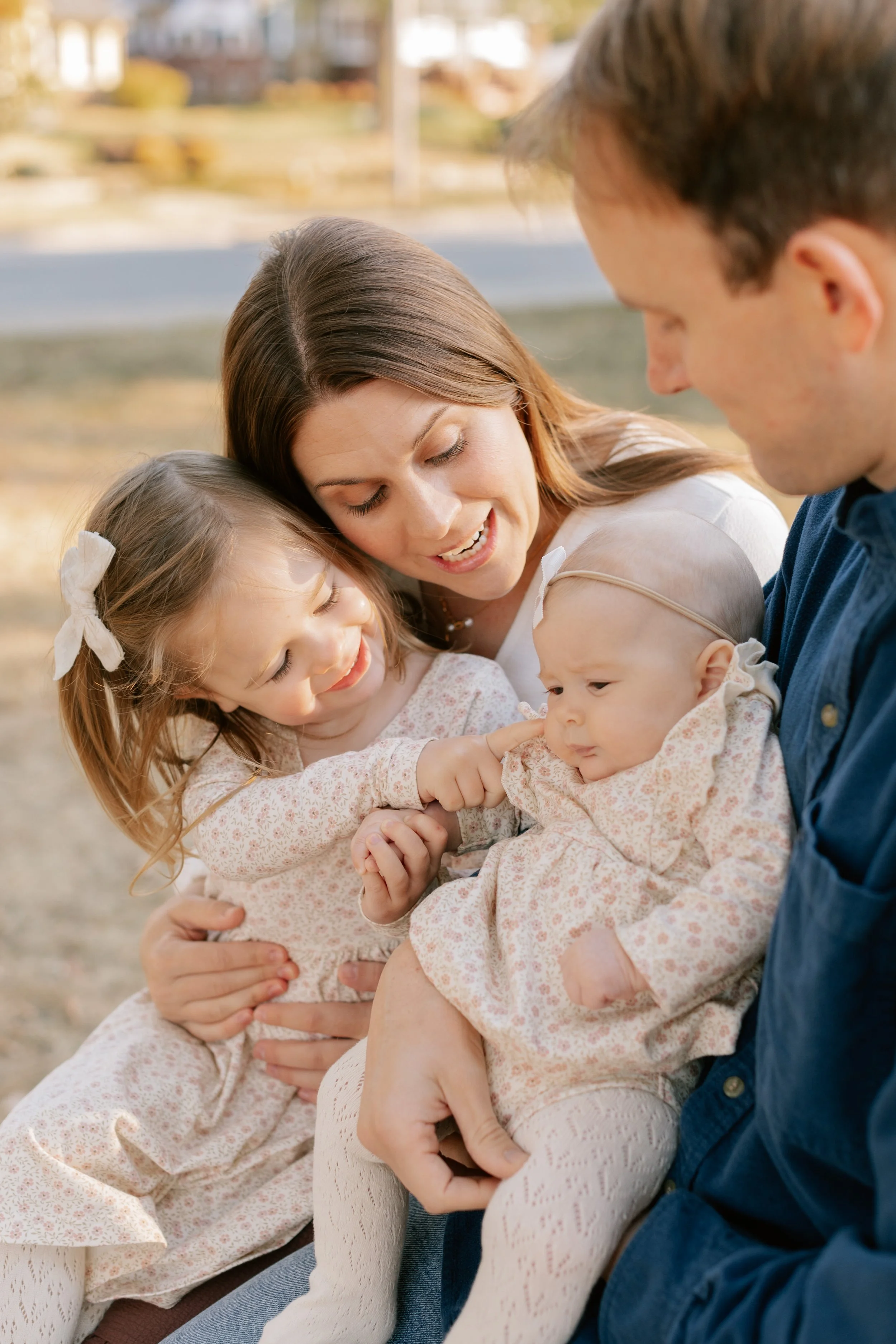 parents with young children in fall setting