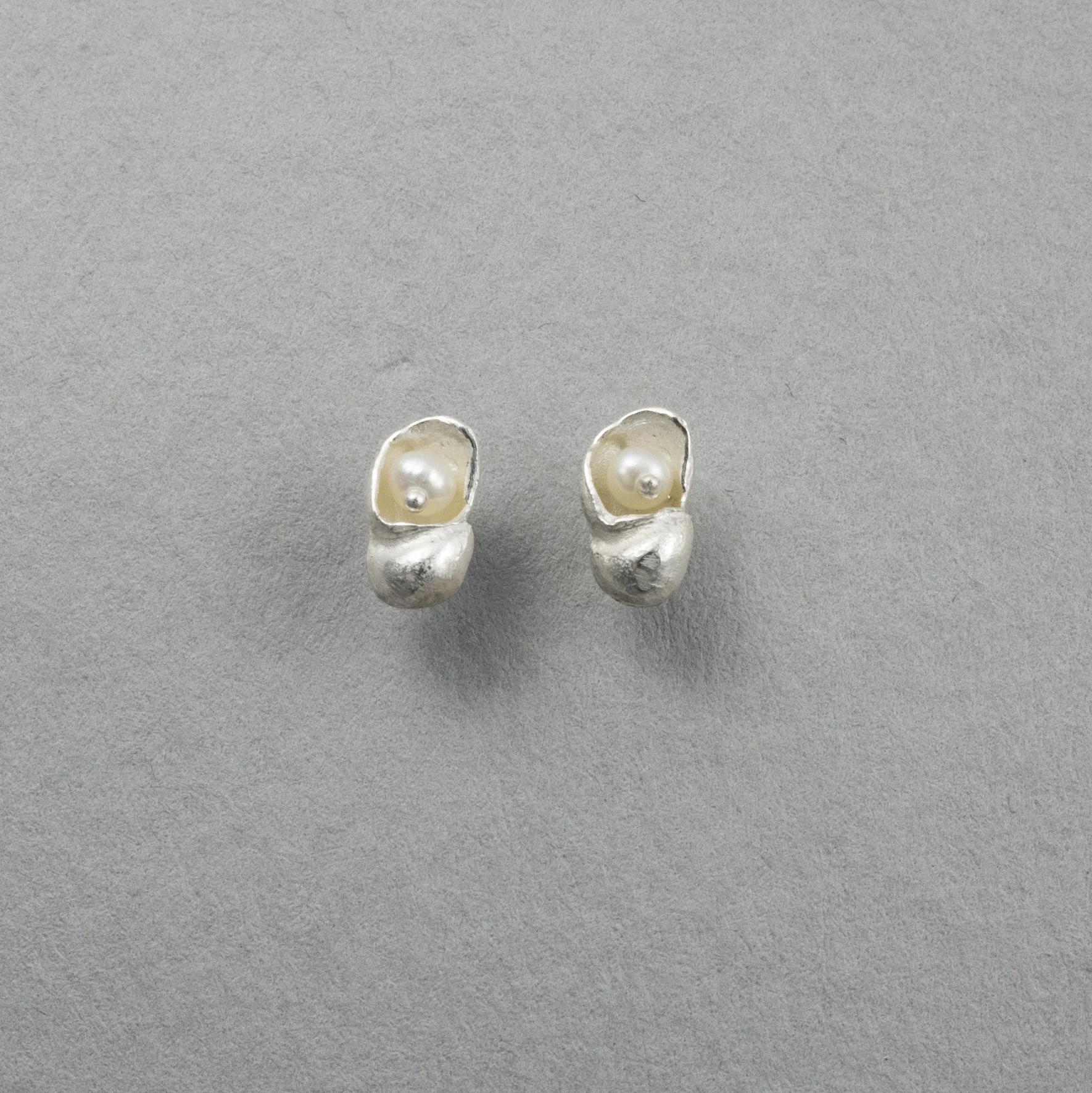 Tiny silver shell earrings with pearls.jpg
