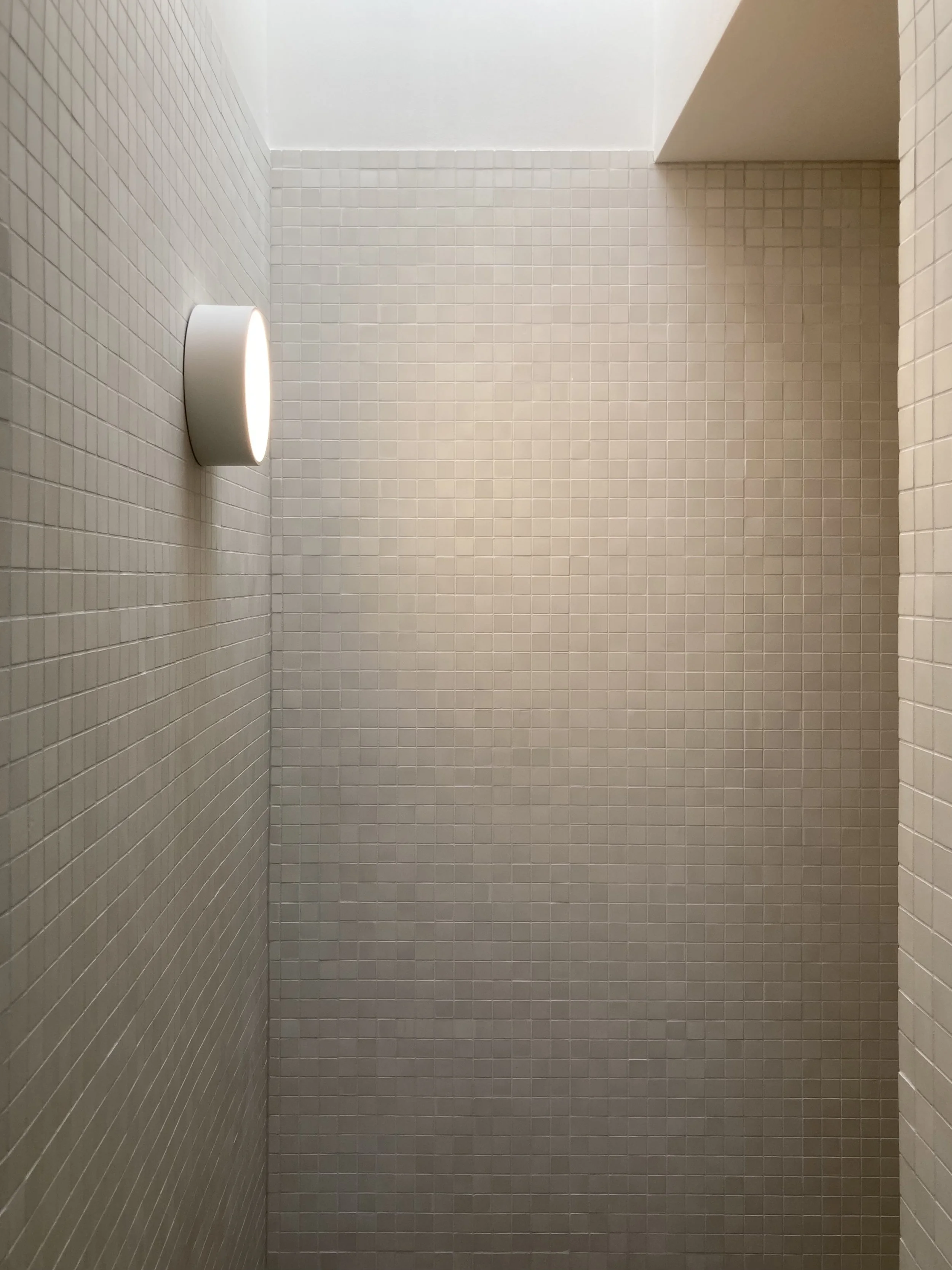 Designed by Taupo, New Zealand Architects Fraser Cameron Architects. Interior Design by Fraser Cameron Architects. Renovation Project by Fraser Cameron Architects. Bathroom designer. Bathroom renovation. Minimalist bathroom design nz. Skylight bathro