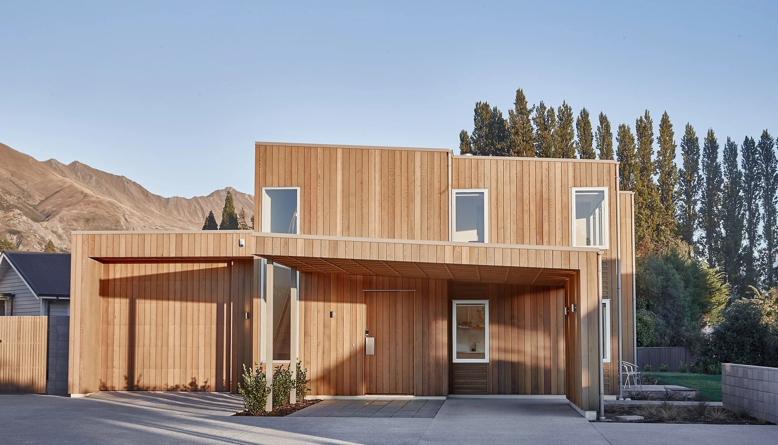 Wanaka House designed by Fraser Cameron Architects Ltd. Western Red Cedar Cladding. Elevation from Street. 