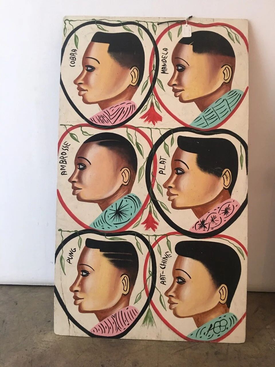 Barbershop sign, c. late 1980s, Abidjan, Ivory Coast, paint, wood, 41" x 24"