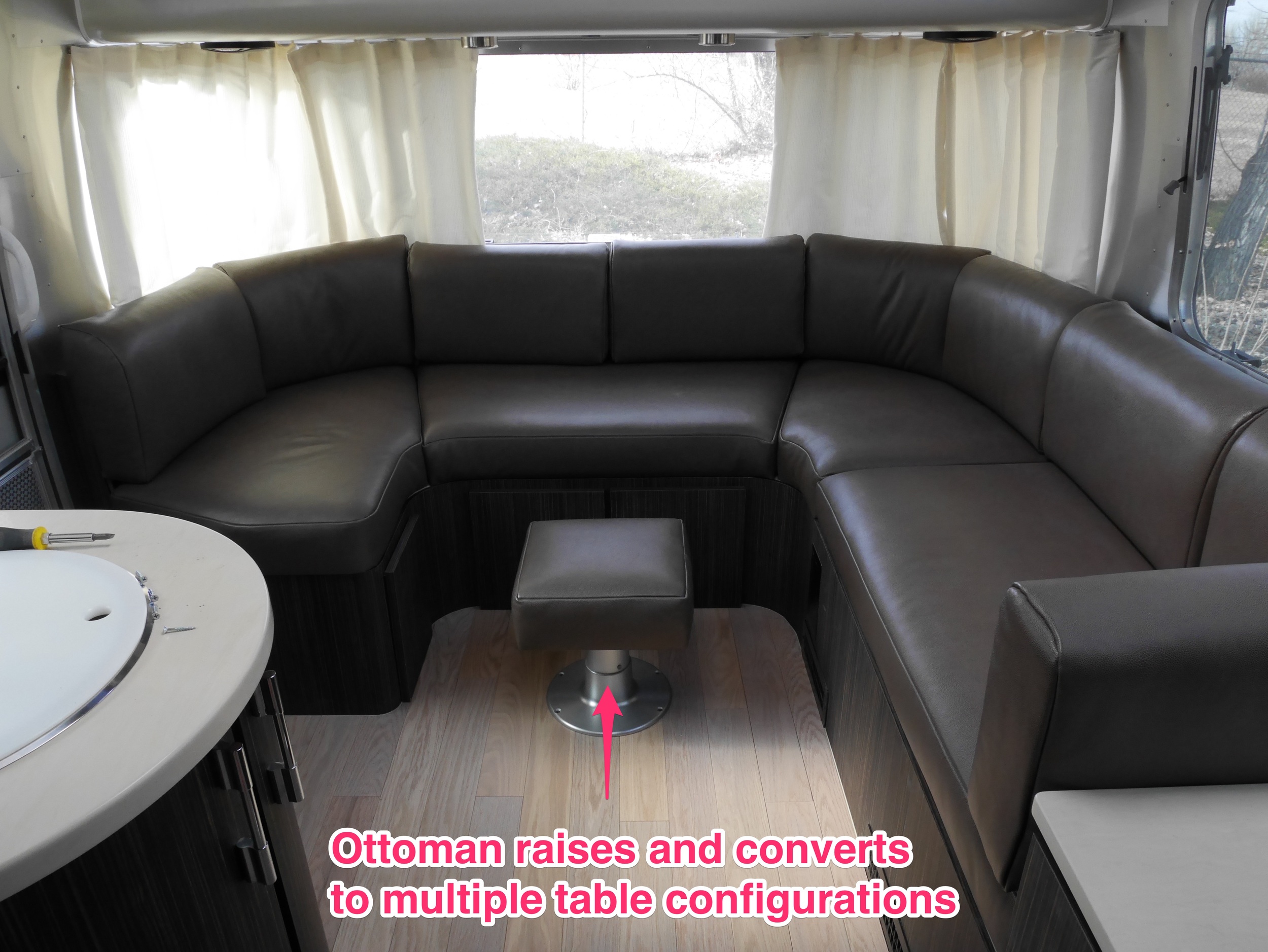 The lounge area has been replaced, losing the gaucho but gaining some much-needed comfort and efficiency improvements. The table (stored under the seat on the right) can convert into a large desk space or a normal sized kitchen table (more photos coming when we get the Airstream back from AM Solar later this week)..