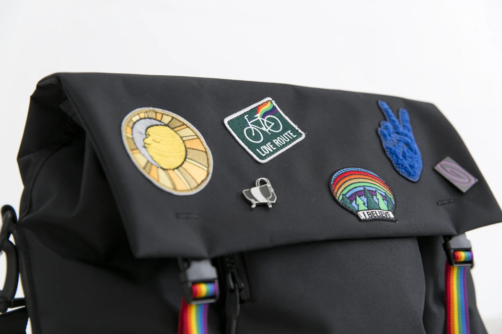 The 2018 Pride Bag features their new Customs Fold Messenger embellished with patches, pins and webbing that were inspired by the colors of the Pride Flag.