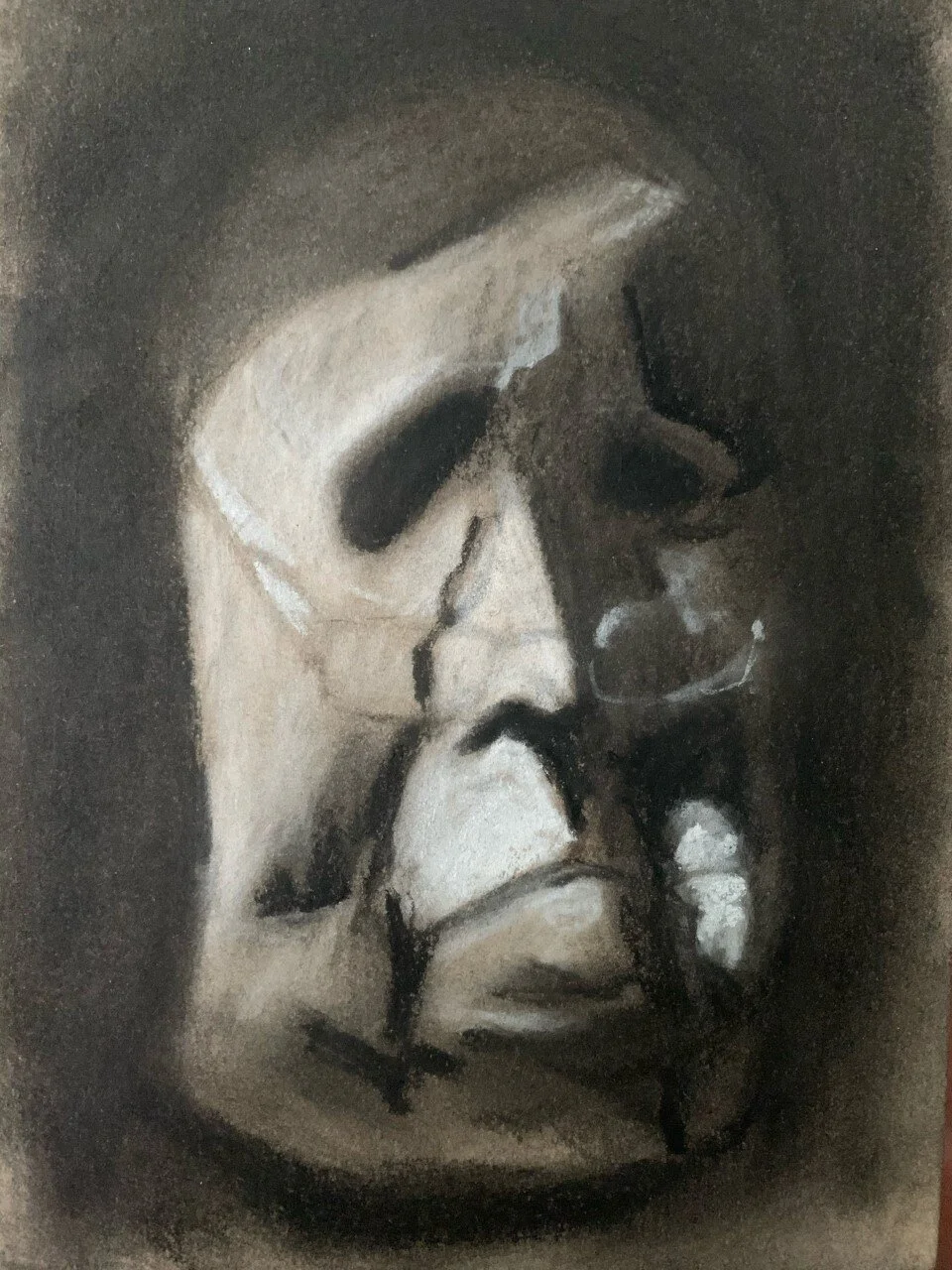 Value Study of Mask, Charcoal (Reductive Drawing), 8.5 x 11", 2020. By Megan Stipes