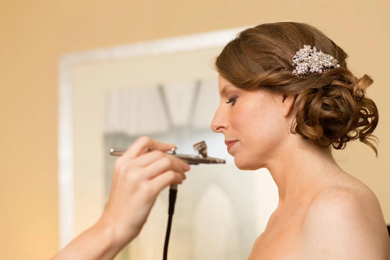 Bridal Beauty Must-Do #5: Be Smart When You Spray Tan For many, sun-kissed color is kind of a no-brainer before a wedding. However, it’s best to schedule it accordingly. “If you spray tan , give yourself a good amount of time beforehand so the tan sets in and you don't reek of it,” says Kira Nasrat , makeup artist and brand ambassador for L.A.'s Violet Grey . And even if you’ve planned a destination wedding in Tulum, resist the urge to get a tiny bit of color by laying out on the beach. Tanning leads to burning leads to peeling, and if you do suffer a sunburn, there’s no going back. Just load up on sunscreen and opt for a faux glow (Nasrat is a fan of James Read's self-tanning line ). Bridal Beauty Must-Do #6: Step Up Your Skin Care Routine Every single makeup artist we spoke with emphasized the importance of taking care of your skin in the months leading up to your wedding. "I always suggest targeting any underlying skin health issues, getting regular facials leading up to the big day, and cleaning up your diet," says Duvall. But let's be real, we get that's not just not happening for everyone, so at the very least Nasrat says to drink a ton of water in the weeks before the big day. Blushington also offers Dr. Neal Schultz 's 40-percent glycolic-acid peel at each location; it provides heavy-duty exfoliation with zero redness or downtime. Bridal Beauty Must-Do #7: Pack an Emergency Makeup Kit In a perfect world, you’d have an entire glam squad following you around and blotting the sweat off your face while between photos. But if you’re not (a.) Mariah Carey or (b.) rolling in dough, having a personal touch-up team might not happen. Almost as good: Bring a small makeup kit with you. “Stash a makeup setting spray to revive your makeup, oil-blotting papers, and the lip color you used,” suggests Matos. Might as well get the most out of your gorgeous makeup. SOURCE: Deanna Pai (www.glamour.com)