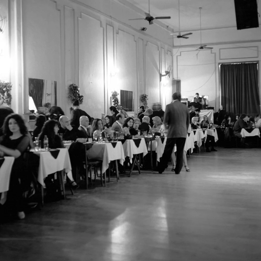 An exploration of the tango culture in Buenos Aires, Argentina. It has a protocol that is deeply rooted in machismo , yet It is about the balance of power and symmetry of energy between the man and the woman. Founded on longing and desires unfulfilled, tango requires 100% emotional attendance. These images were done in medium format film, silver gelatin print.