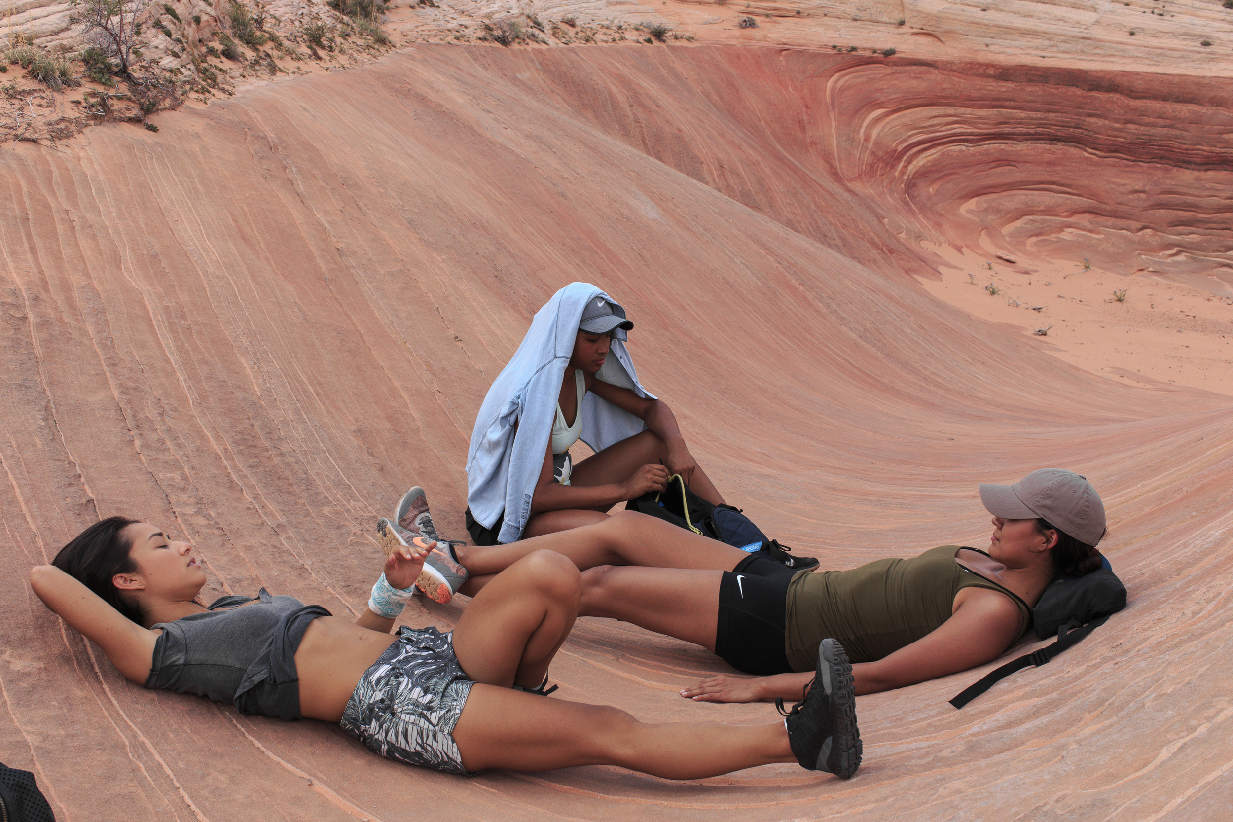 Relaxing with the earth and two of my favorite people, Sierra, Ty. Photo by Thosh.