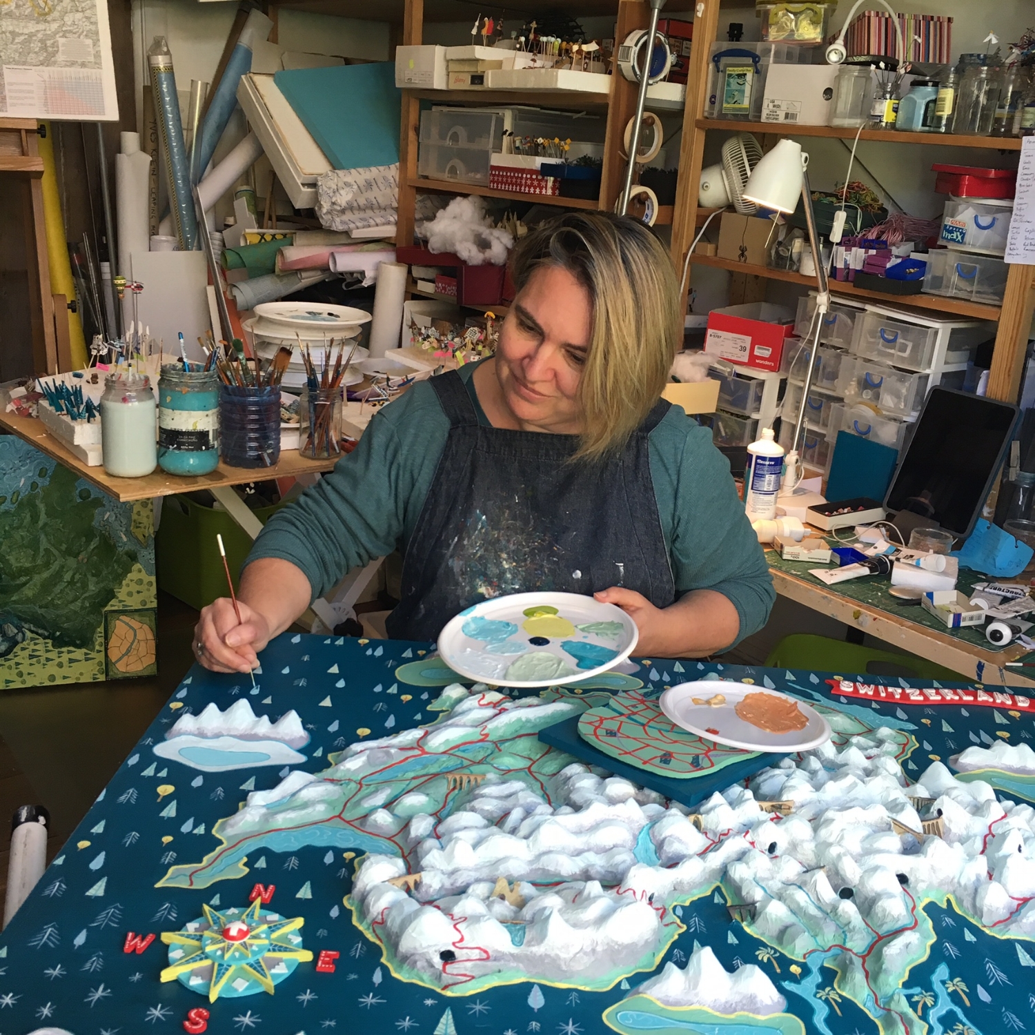 Working on a commission in the studio.
