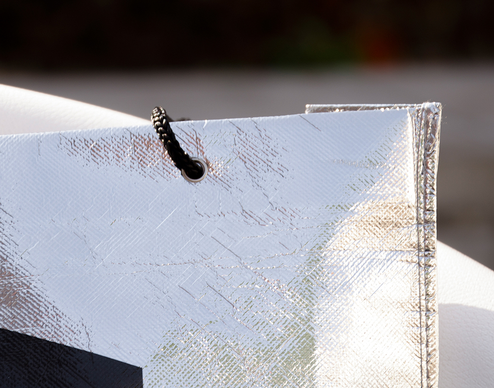 c-bags voor Reflectplus // single cyclus ecologische draagtassen // PP non woven bedrukte draagtassen - gealuminiseerde laminatie
