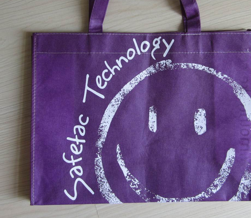 c-bags bedrukte draagtassen voor Safetac Technology // single cyclus ecologische draagtassen // PP non woven // scherpe prijs