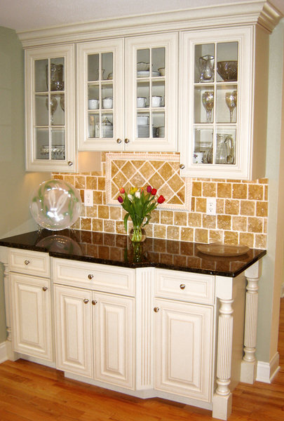 Glass Cabinets Tumbled Marble Backsplash optimized.jpg