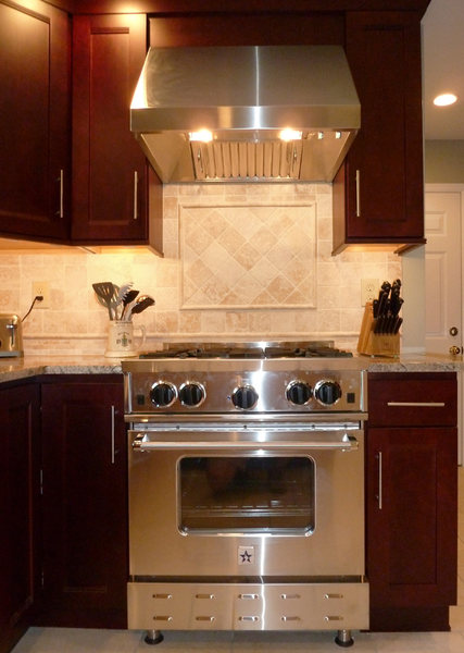 A&E Construction Kitchen Remodel Stainless Stove Hood Tile Inset Backsplash.jpg
