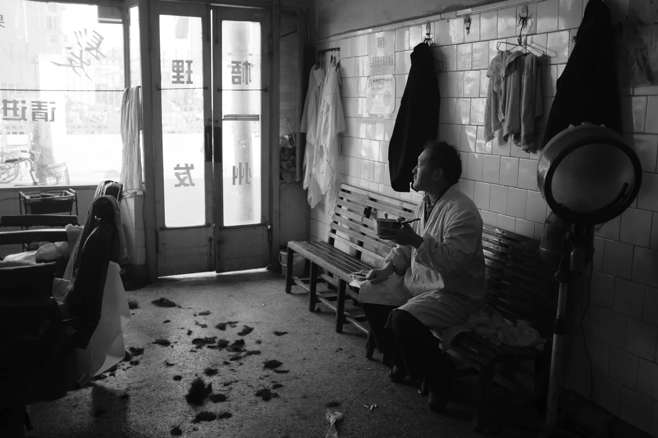 A fading craft and space: Wu Zhou Barbershop and its owner Mr. Ding.