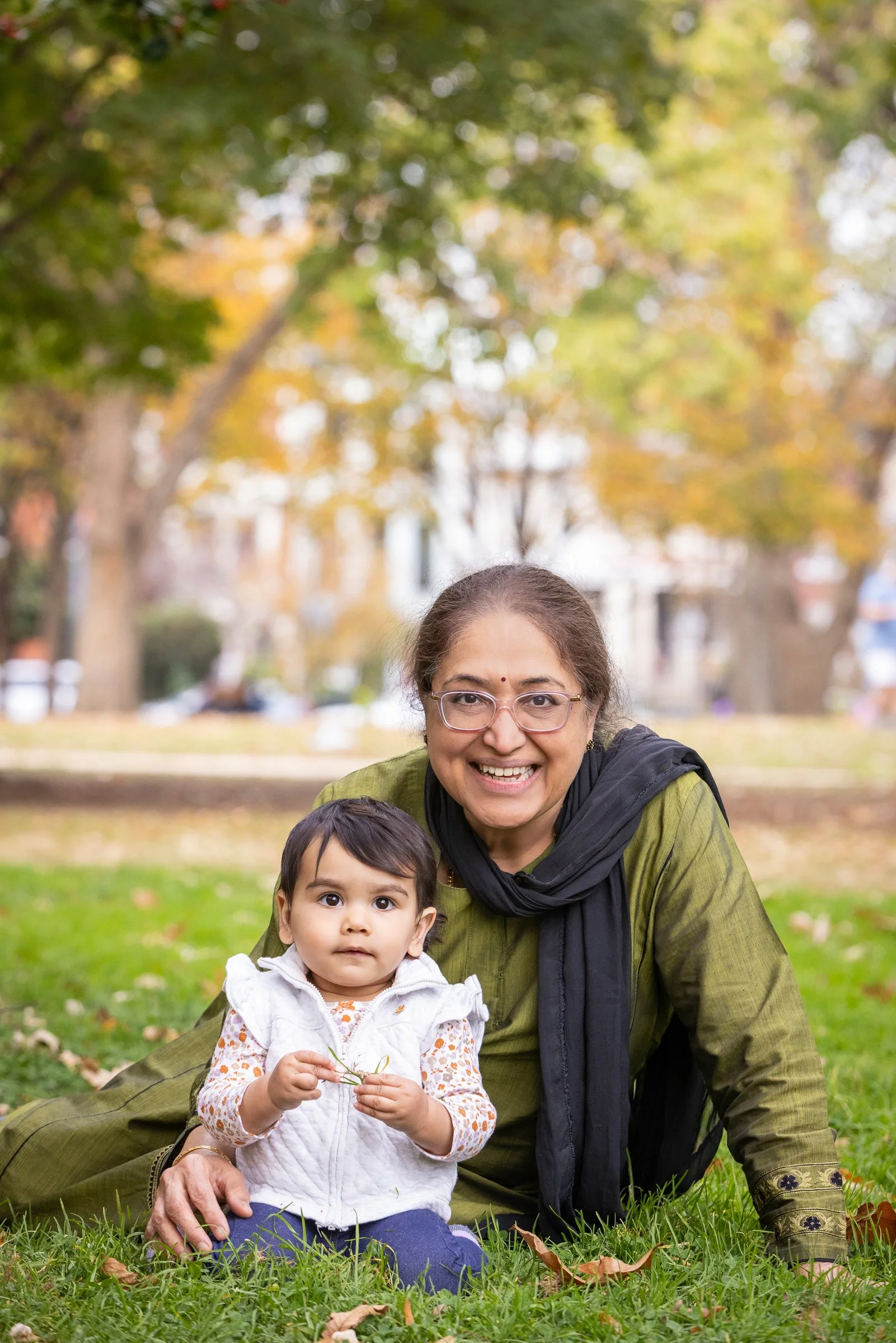 Legacy heirloom outdoor portrait of baby with grandparent in Lincoln Park, Washington, D.C.