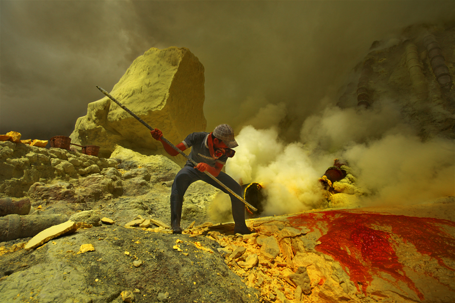 The miners work with bare hands, using an iron rod to remove the sulfur from the crater and over the mountains to offload the sulfur at the station, 4km away. 