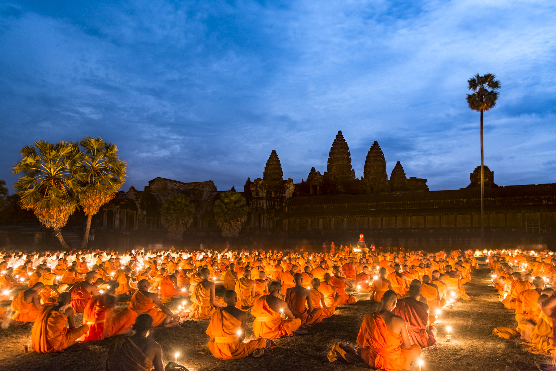 Hundreds of monks and nuns gather under the full moon in front of Angkor Wat for the annual Visak Bochea festival to honour Buddha's enlightenment.