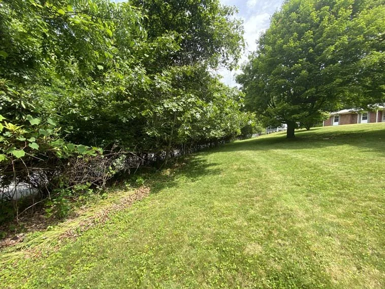 MLS 244100 • SOLD! Near downtown Boone, new open decks, privacy fence