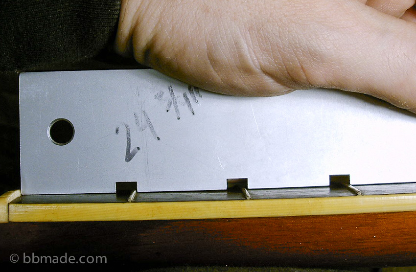 Excessive ramping in a 1929 Gibson L-3 close up. Careful evaluation of each guitar will determine the unique approach to make it the best it can be.