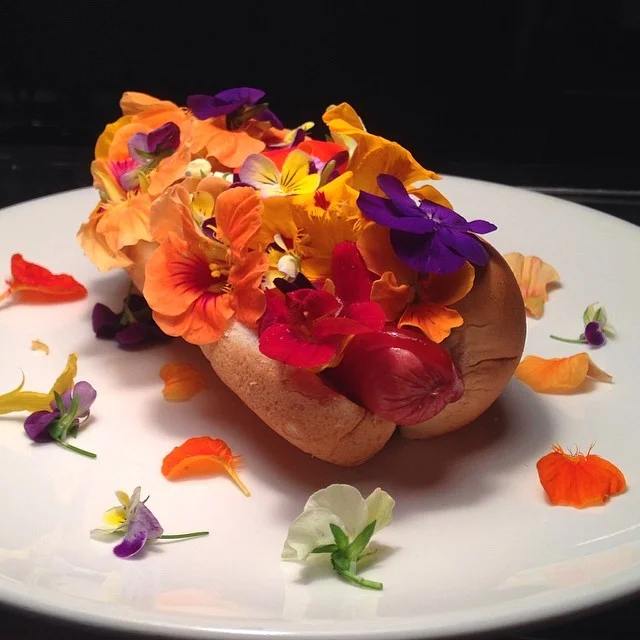 Hot Dog. Edible Flowers. Ketchup.