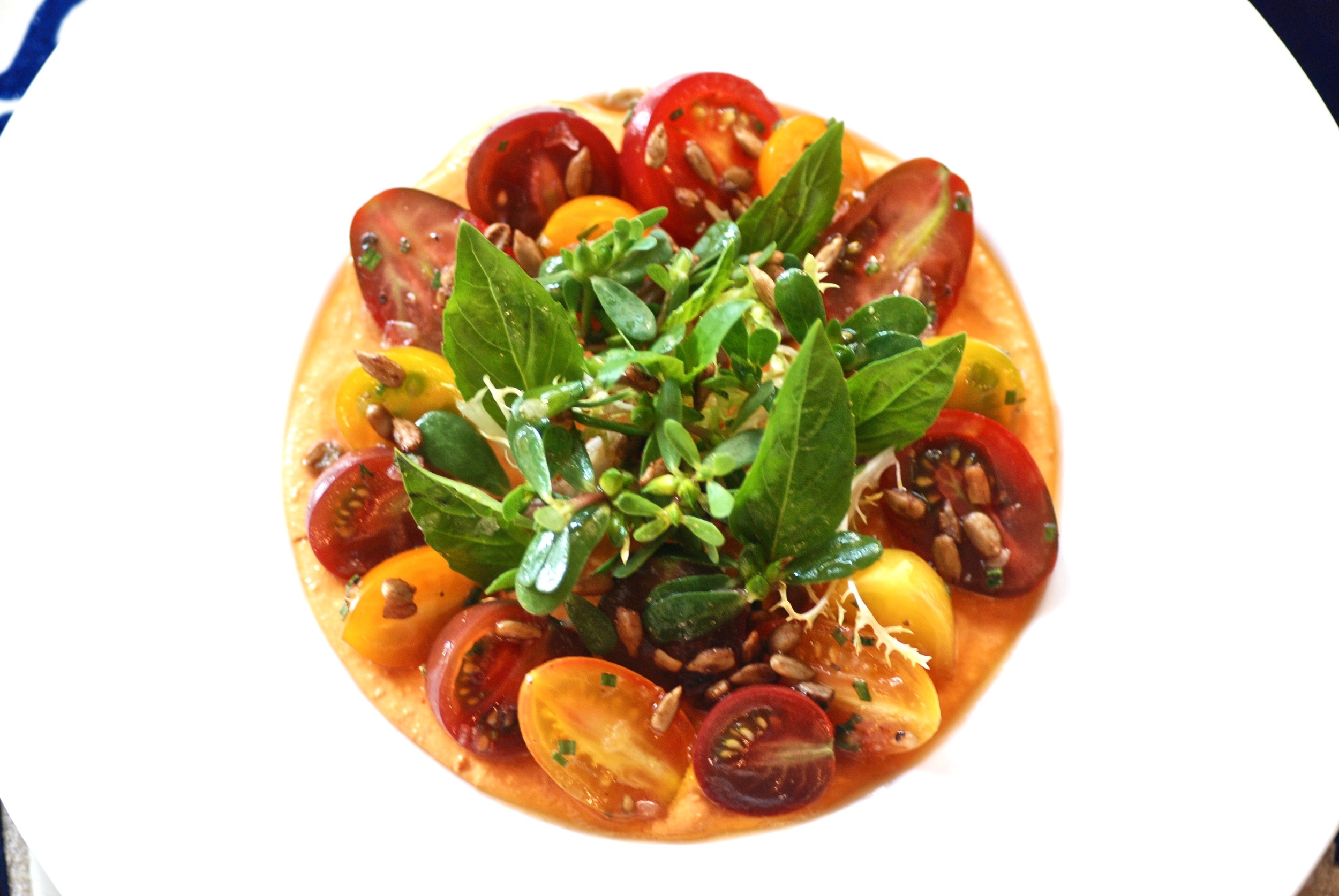 Tomato. Ricotta. Calabrian Chili. Basil. Purslane. Sunflower.