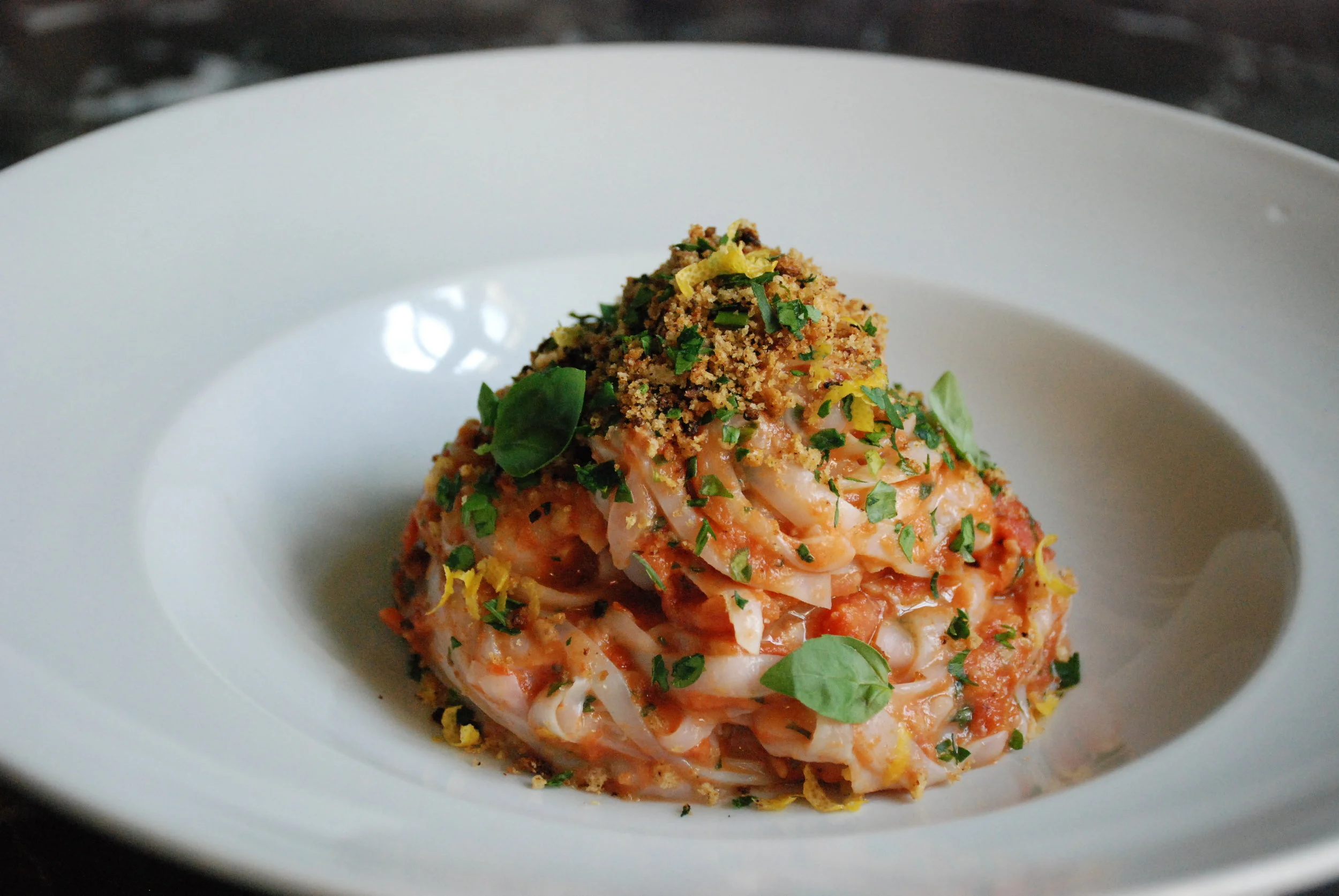  Calamari Tagliatelle. Pomodoro. Lardo. Gremolata. 