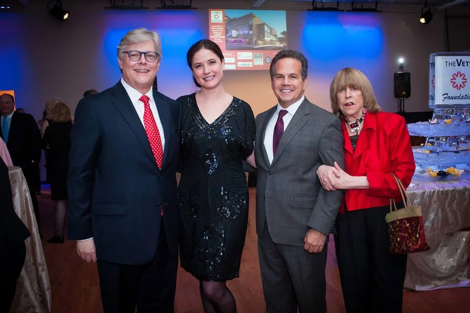 Board member and past President Paul Brooks, board member Kaitlyn A. Frolich, the Honorable David Cicilline and guest