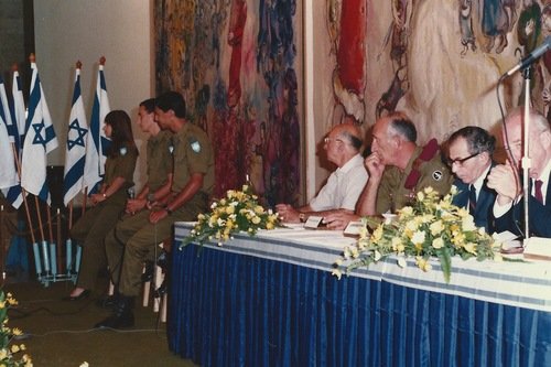 Gitit Shoval during her army service, singing at an event with the late Prime Minister, Yitzhak Rabin. 
