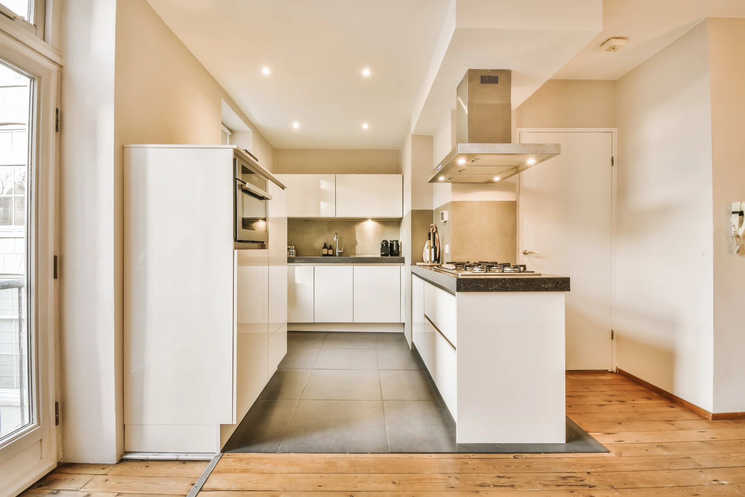 bright-modern-kitchen-with-white-cabinets-and-appl-2026-03-18-11-10-23-utc.jpg