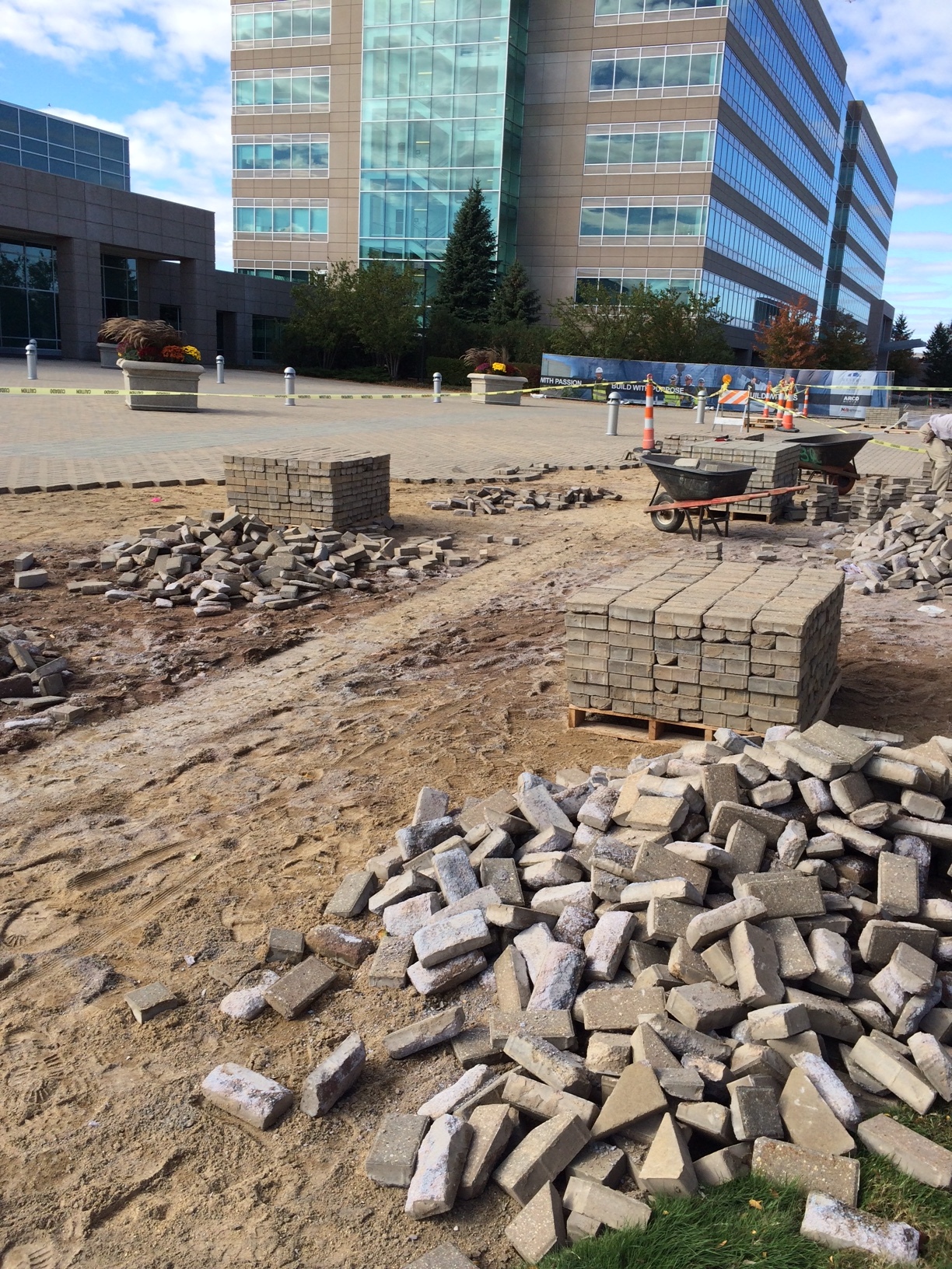 Removal of pavers from plaza for new drive lane