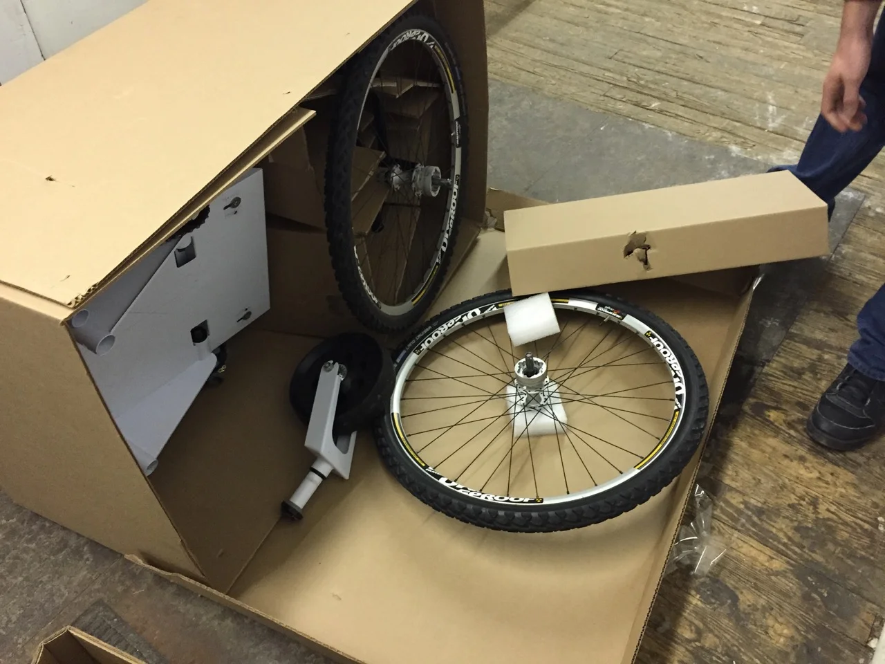 Our first drop test taught us the importance of good straps. They pull the walls of the box against the internal bracing, holding everything together a lot more securely than tape or staples!