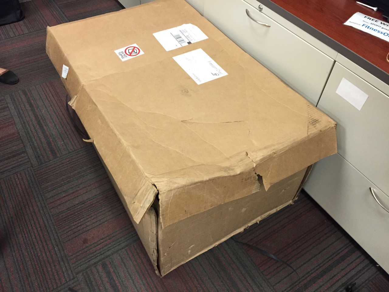 We did a test shipment to Phoenix. The box was beat up pretty badly, and most of the straps were missing. The chair inside was in perfect condition, but we knew we had more work to do to keep the box in good shape.