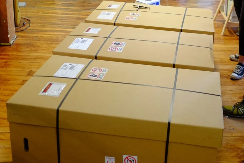 Three of our first boxes, lined up and ready to ship!