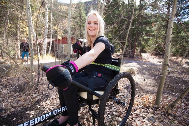 Although she has a high level spinal cord injury, Ellie uses a combination of Active Hands Grip Aids and a chest strap to allow her to operate the GRIT Freedom Chair safely and independently.