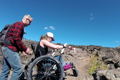 My boyfriend giving me a spot up a technically challenging ascent. 