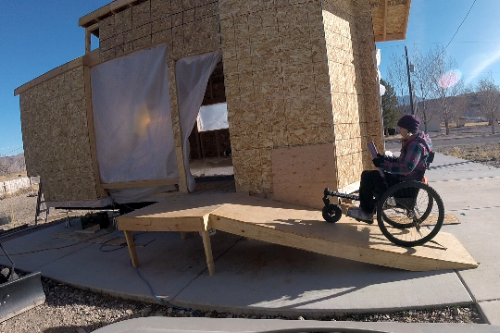 Our temporary/working ramp into our house is almost 3 times a steep as ADA standard. The climb hurts my shoulders in my regular wheelchair, but is no problem in the GRIT Freedom Chair.