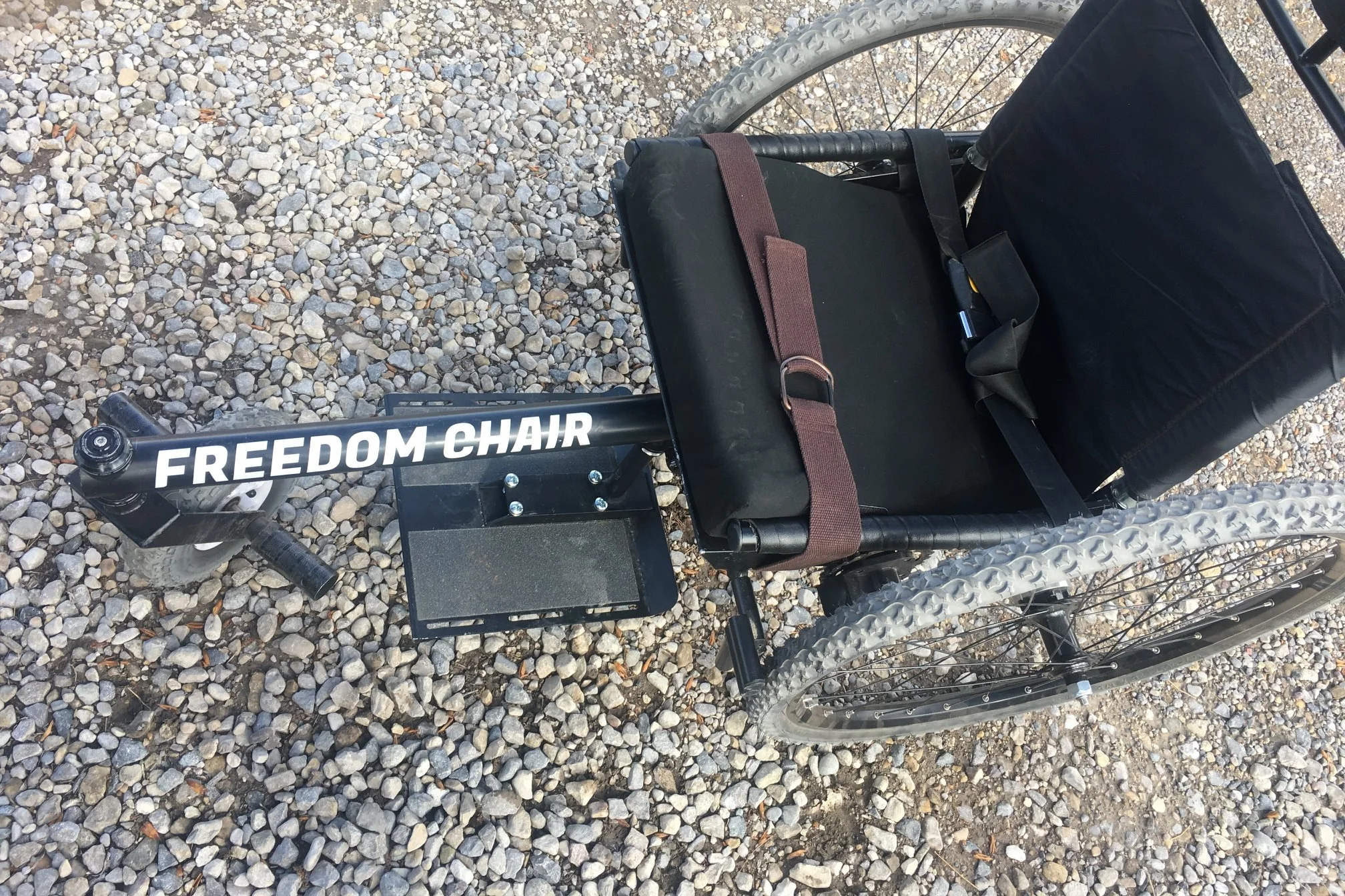 If you don't stow your levers in your luggage, we recommend securing a strap around the seat frame to hold them securely during travel. (Photo Credit: Ralph Staus)