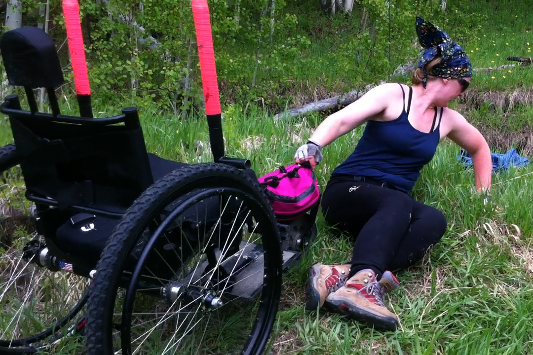 Dragging myself and my GRIT Freedom Chair over a difficult section of terrain.