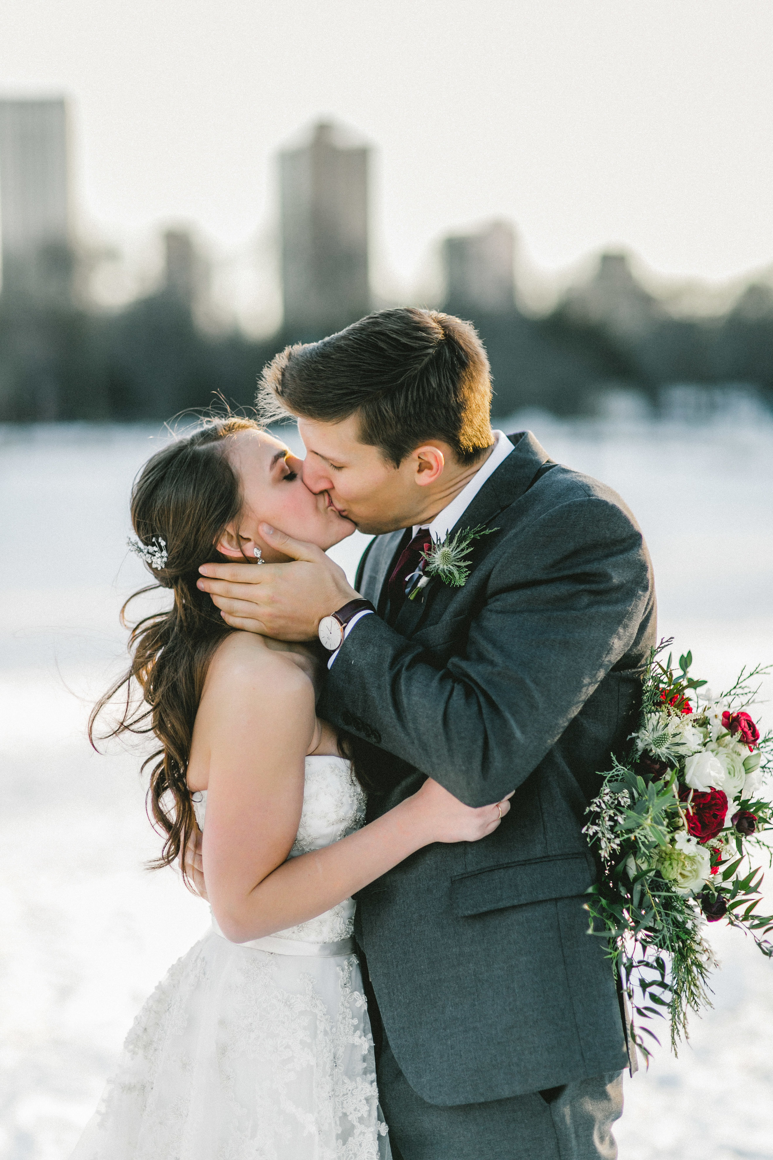 Winter Snowy Wedding Couple Kissing Portrait