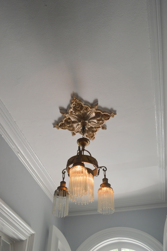 I was obsessed with all of the light fixtures and chandeliers throughout the house! This one in the entryway was my favorite!