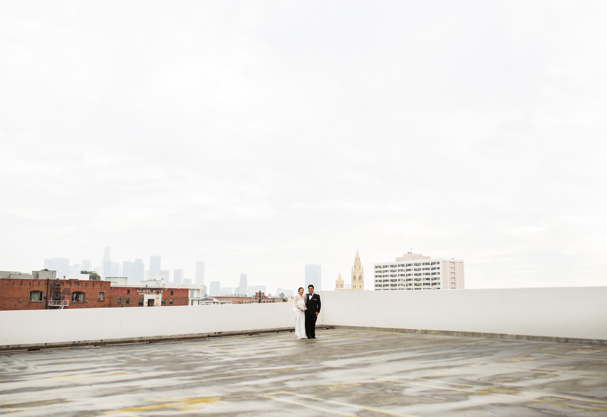 ©Isaiah & Taylor Photography - Destination Wedding Photographers - Downtown Los Angeles Parking Lot Rooftop Wedding-017.jpg