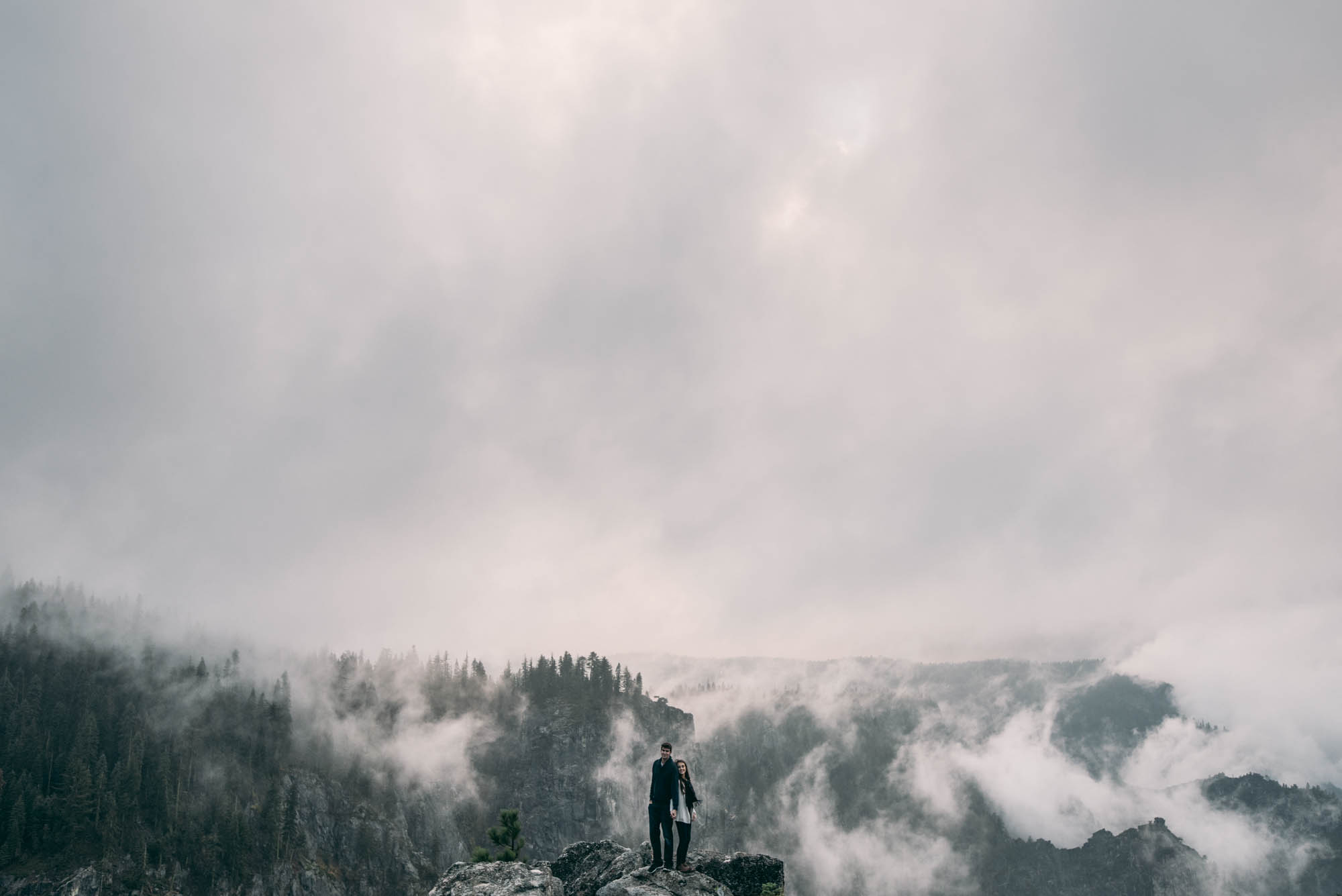 ©Isaiah & Taylor Photography - Stormy Cliffside Engagement, Yosemite California-25.jpg