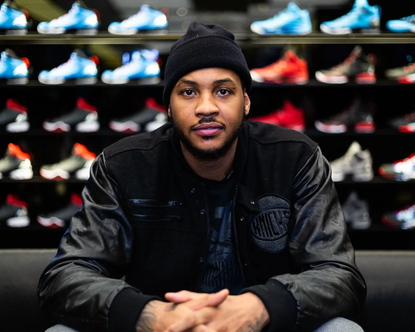 @CarmeloAnthony seated by his Melo M10 shoe line at the Jordan &ldquo;Flight 23&rdquo; store opening &bull; 1/30/2014