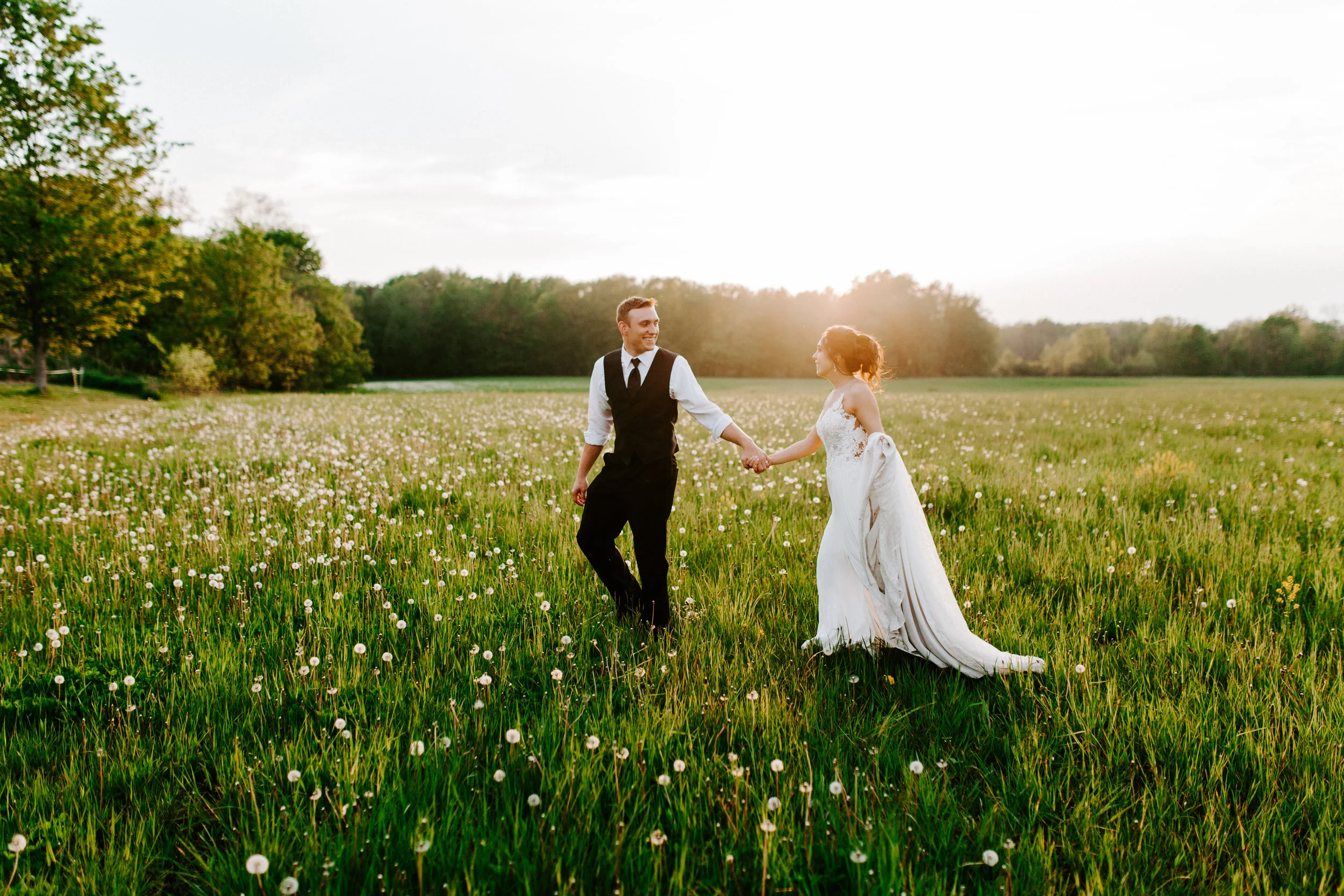 An Irish Hills wedding in Southern Michigan full of charm, Ray and MacKenzie’s wedding included a unique stop to the Michigan International Speedway to revisit where the bride and groom first met.