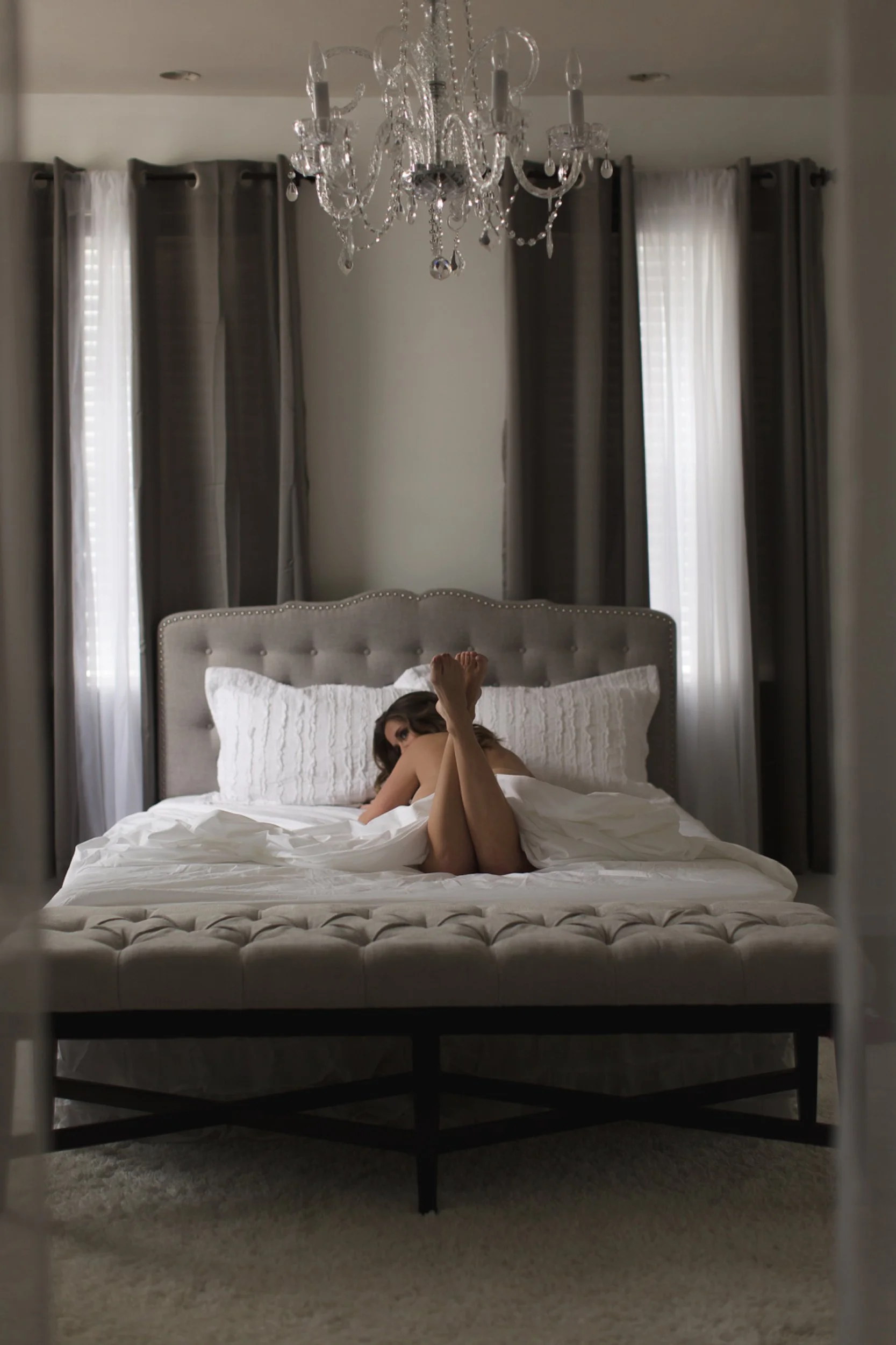 BOUDOIR SHOT WITH CHANDELIER- WHITE SHEET BOUDOIR PHOTOS