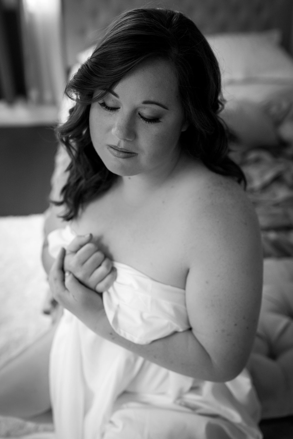 White sheet boudoir shot