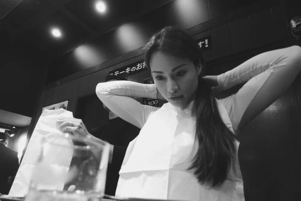 Putting on the paper apron