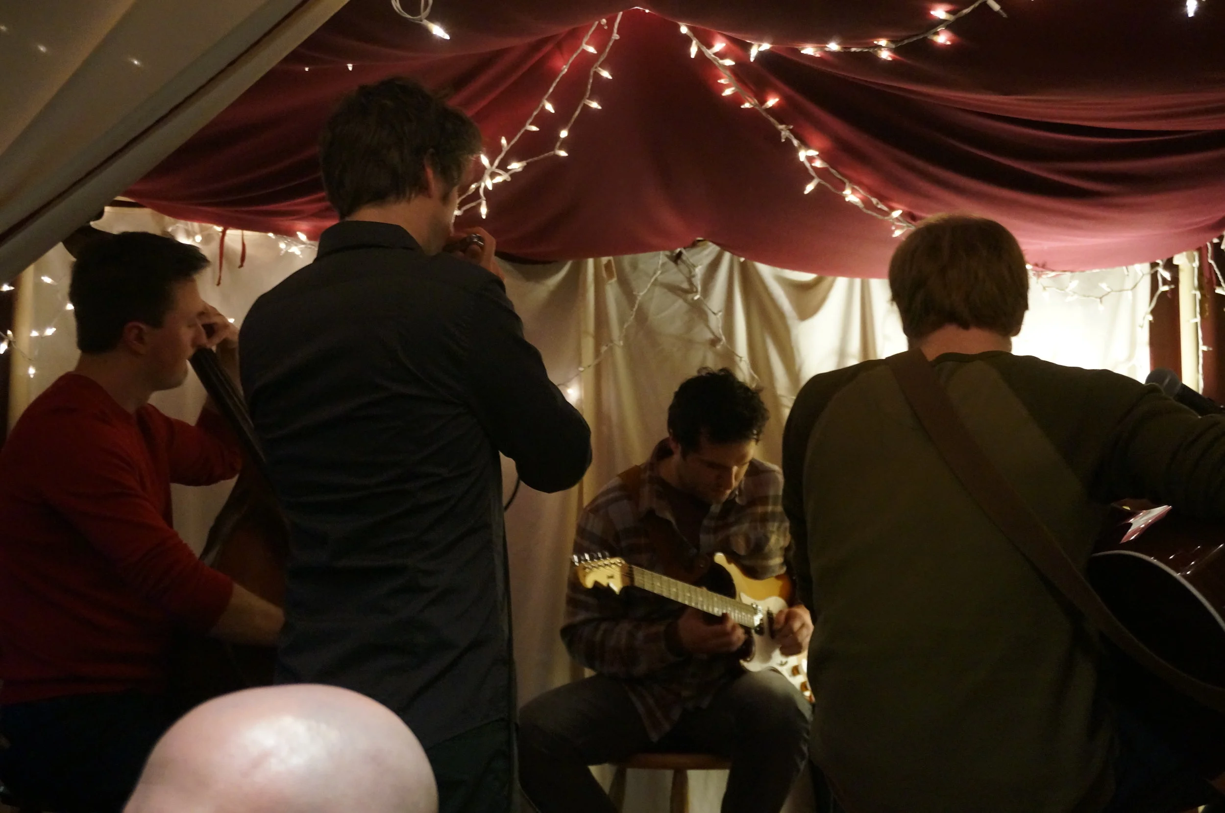 Folky jazz with guitar, bass, vocals, and harmonica!