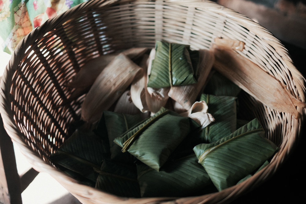  The stack of ready-to-cook chuchitos and tamalitos. 